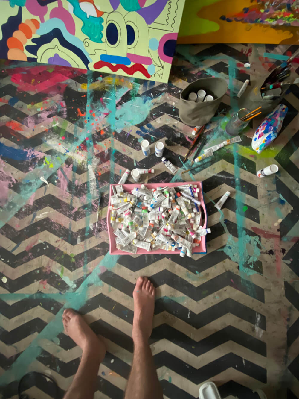 Mike Perry painting assets on the floor